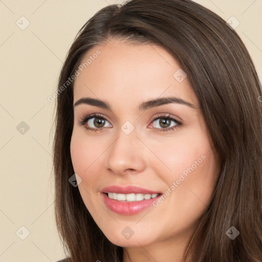 Joyful white young-adult female with long  brown hair and brown eyes