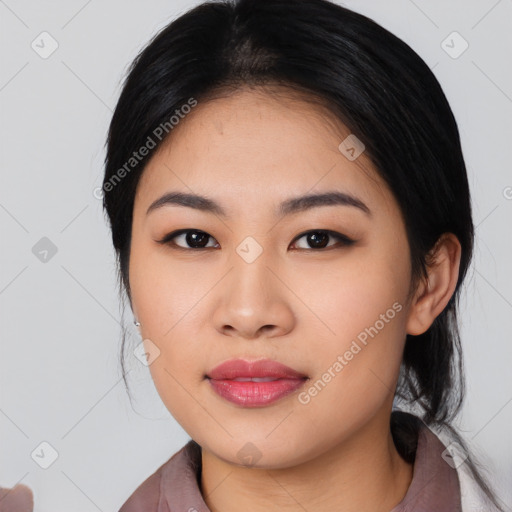 Joyful asian young-adult female with medium  black hair and brown eyes