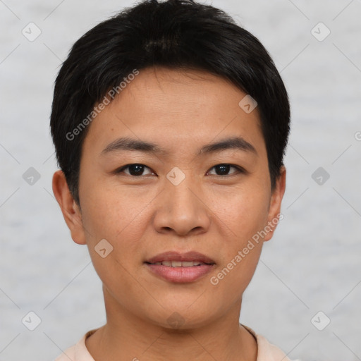 Joyful asian young-adult male with short  brown hair and brown eyes