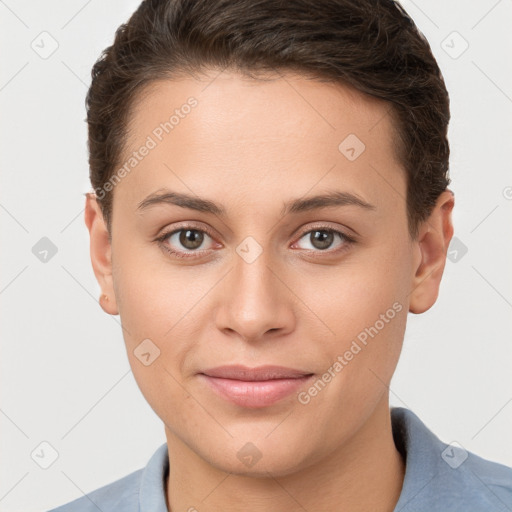 Joyful white young-adult female with short  brown hair and brown eyes