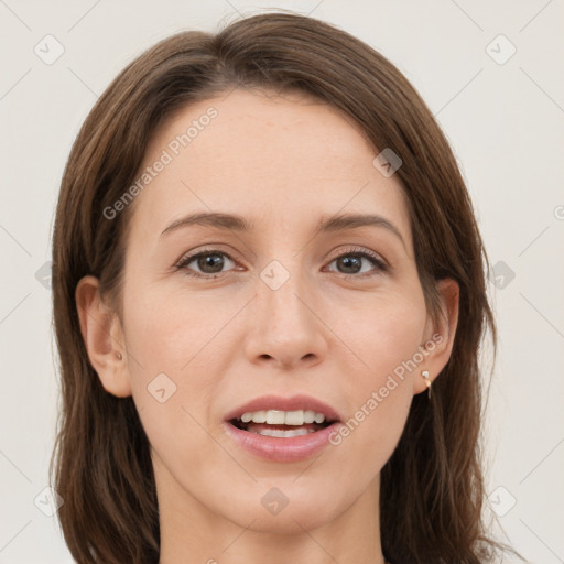 Joyful white young-adult female with long  brown hair and grey eyes