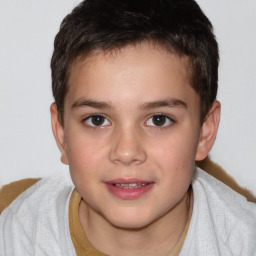 Joyful white child male with short  brown hair and brown eyes