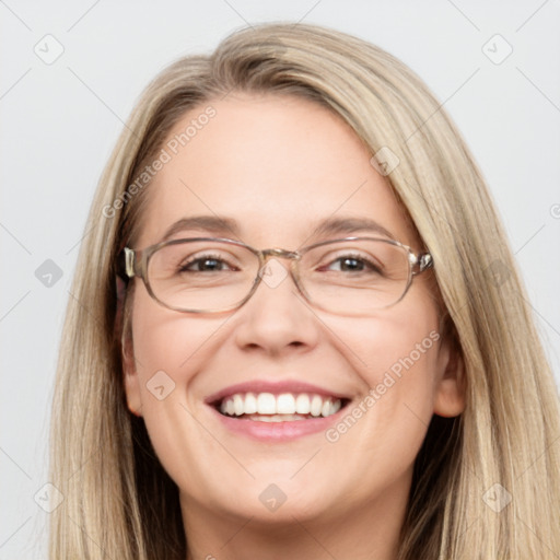 Joyful white adult female with long  brown hair and grey eyes