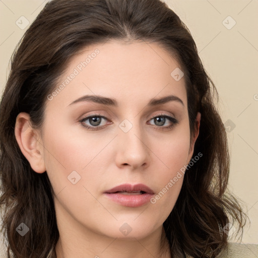 Neutral white young-adult female with long  brown hair and brown eyes