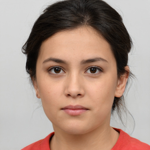 Neutral white young-adult female with medium  brown hair and brown eyes