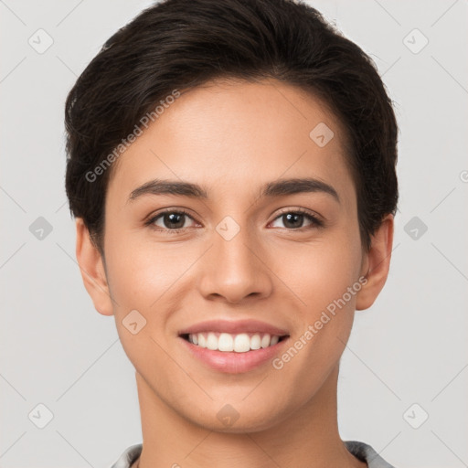 Joyful white young-adult female with short  brown hair and brown eyes