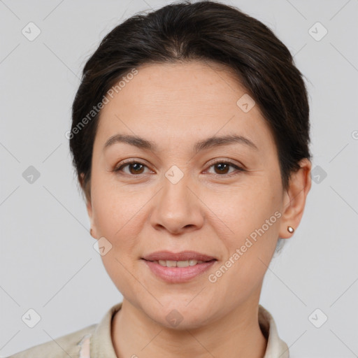 Joyful white adult female with short  brown hair and brown eyes