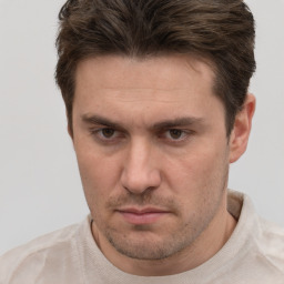 Neutral white adult male with short  brown hair and brown eyes