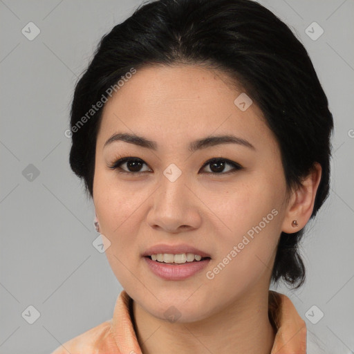 Joyful asian young-adult female with medium  black hair and brown eyes