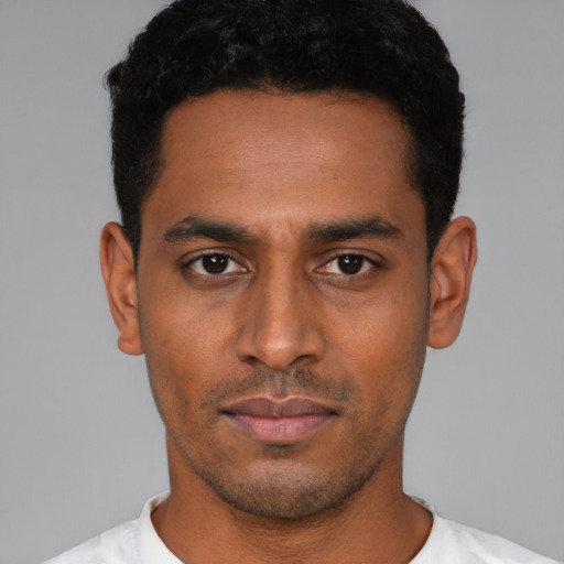 Neutral latino young-adult male with short  black hair and brown eyes