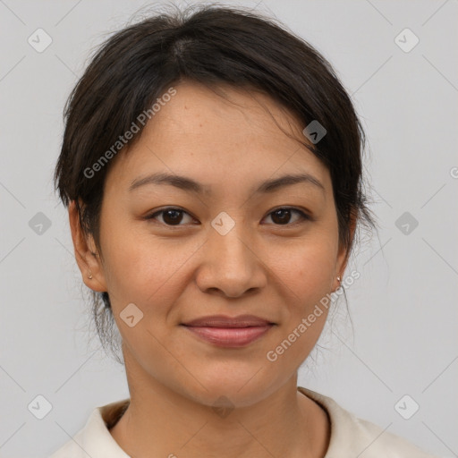 Joyful asian young-adult female with short  brown hair and brown eyes