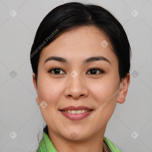 Joyful asian young-adult female with short  black hair and brown eyes