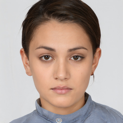 Neutral white young-adult female with short  brown hair and brown eyes