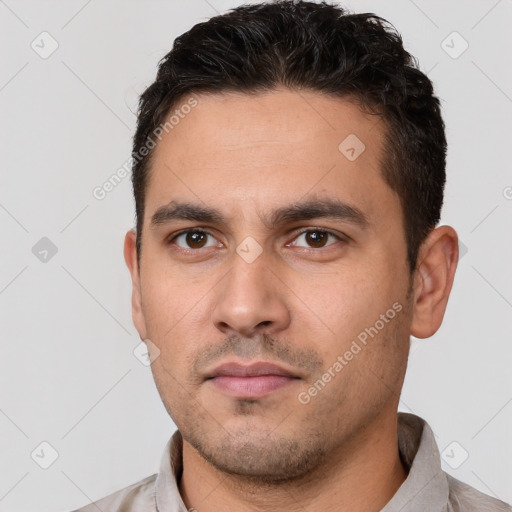 Neutral white young-adult male with short  brown hair and brown eyes