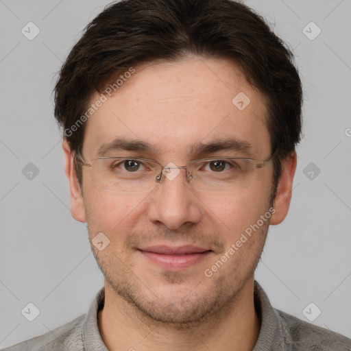 Joyful white adult male with short  brown hair and brown eyes