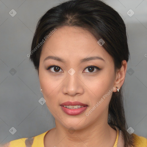 Joyful asian young-adult female with medium  brown hair and brown eyes