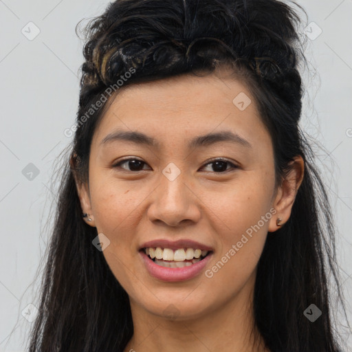 Joyful asian young-adult female with long  brown hair and brown eyes