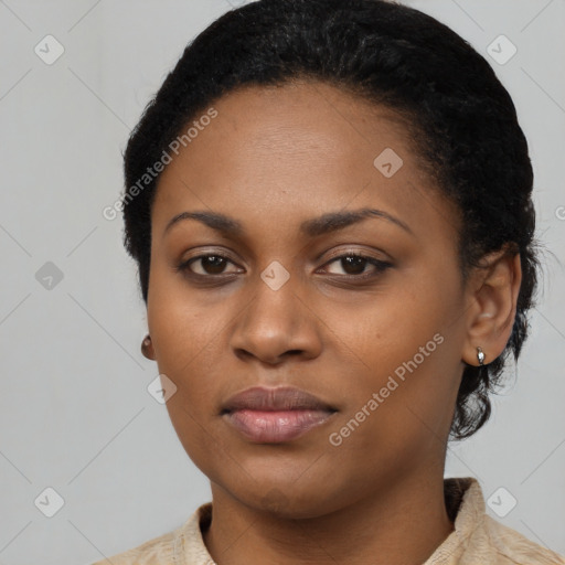 Neutral black young-adult female with short  black hair and brown eyes