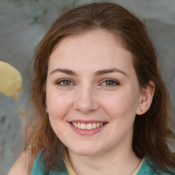 Joyful white young-adult female with medium  brown hair and green eyes