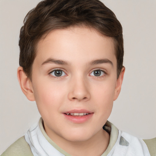 Joyful white child female with short  brown hair and brown eyes