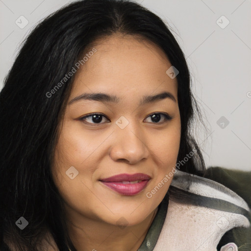 Joyful asian young-adult female with long  brown hair and brown eyes