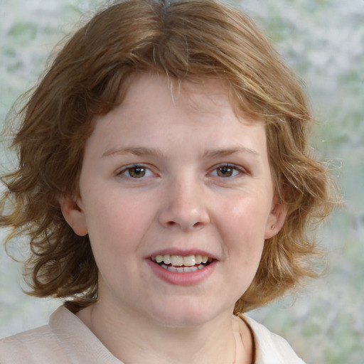 Joyful white child female with medium  brown hair and brown eyes