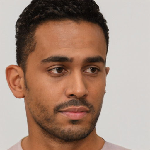 Neutral latino young-adult male with short  black hair and brown eyes