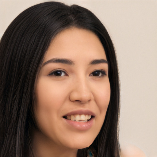 Joyful latino young-adult female with long  brown hair and brown eyes