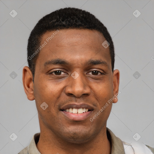 Joyful latino young-adult male with short  brown hair and brown eyes