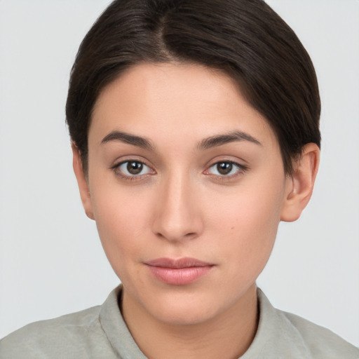 Neutral white young-adult female with short  brown hair and brown eyes