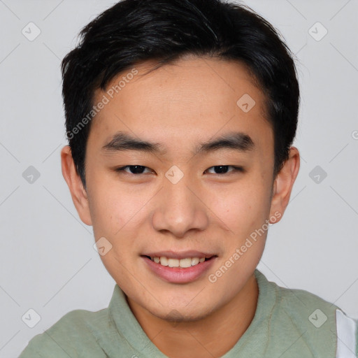 Joyful asian young-adult male with short  black hair and brown eyes