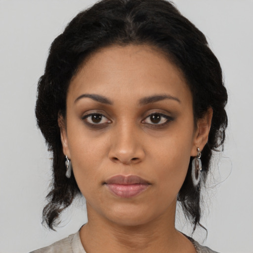 Neutral latino young-adult female with medium  black hair and brown eyes