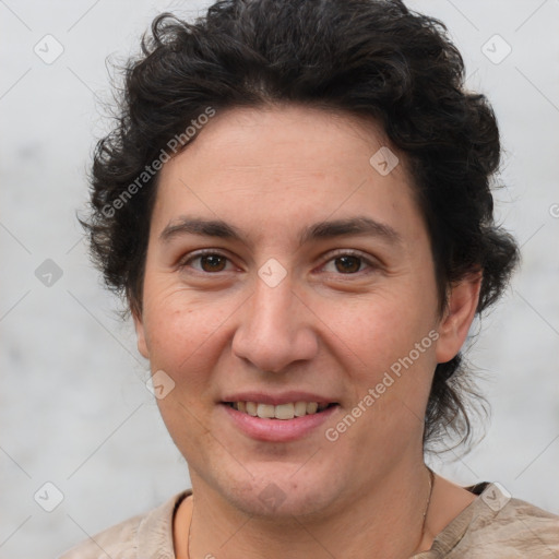 Joyful white adult female with short  brown hair and brown eyes