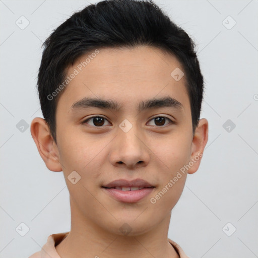 Joyful asian young-adult male with short  brown hair and brown eyes