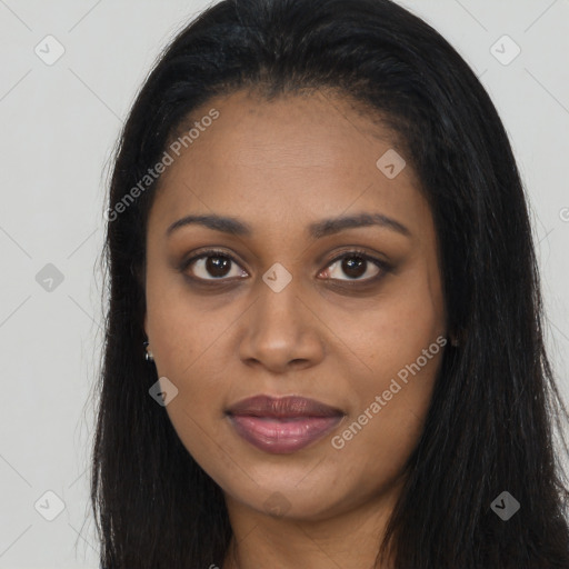 Joyful black young-adult female with long  brown hair and brown eyes