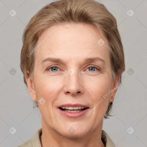 Joyful white adult female with short  brown hair and grey eyes