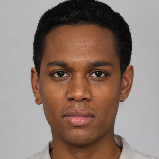 Neutral black young-adult male with short  black hair and brown eyes