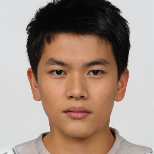 Neutral asian child male with short  brown hair and brown eyes