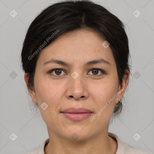 Joyful asian adult female with medium  brown hair and brown eyes