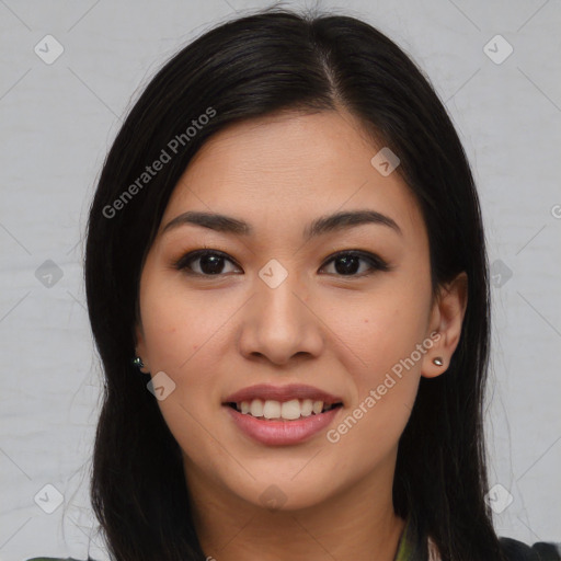 Joyful latino young-adult female with long  brown hair and brown eyes