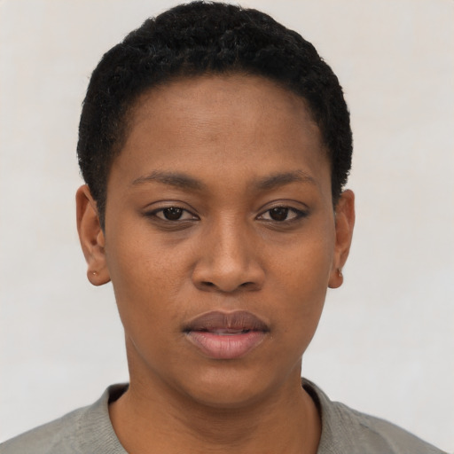 Neutral black young-adult female with short  black hair and brown eyes