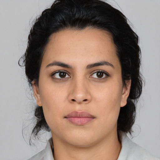 Neutral latino young-adult female with medium  black hair and brown eyes