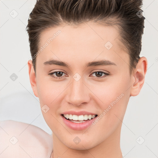 Joyful white young-adult female with short  brown hair and brown eyes