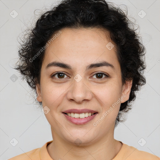 Joyful latino young-adult female with short  brown hair and brown eyes