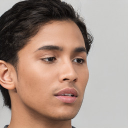 Neutral latino young-adult male with short  brown hair and brown eyes