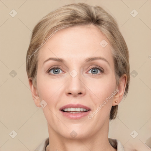 Joyful white adult female with medium  brown hair and grey eyes