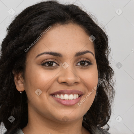 Joyful latino young-adult female with long  brown hair and brown eyes