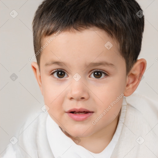 Joyful white child male with short  brown hair and brown eyes