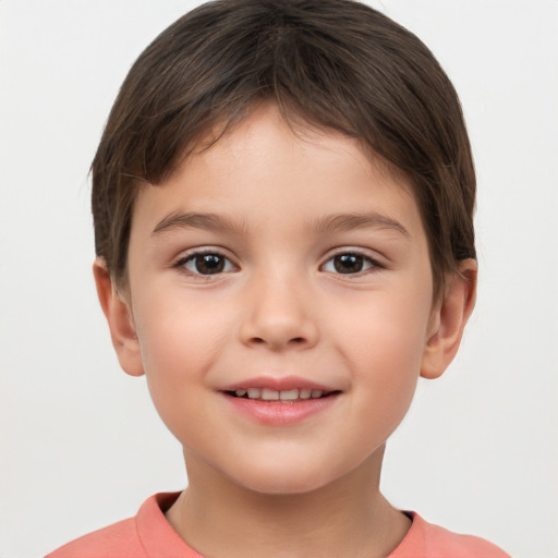 Joyful white child female with short  brown hair and brown eyes