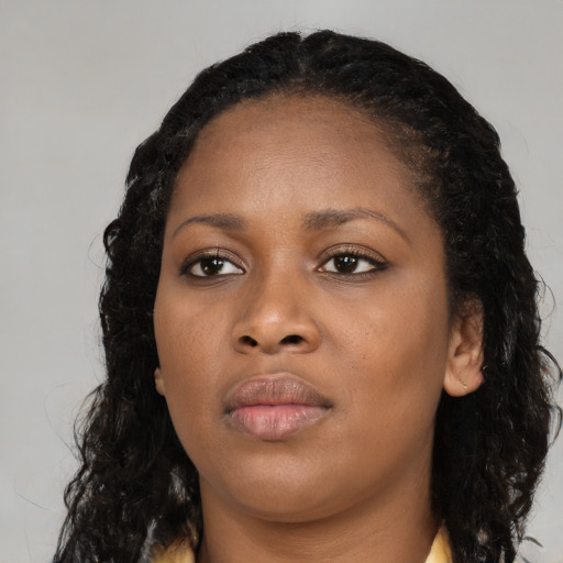 Neutral black young-adult female with long  black hair and brown eyes